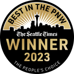 Seattle Times best in the PNW Award. Gold medal with Seattle in the background.